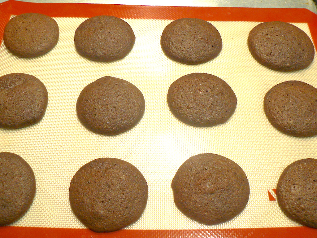 When the half moon cookies were done, they just needed to cool. Then they were frosted with vanilla and chocolate frosting to make them look like little half moons!