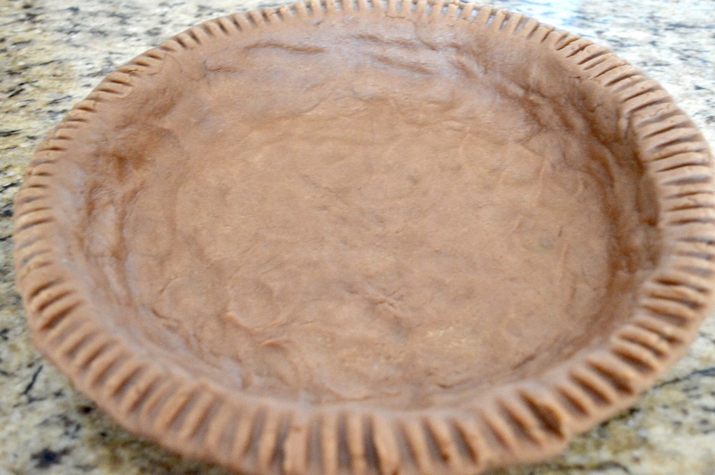 I pressed the chilled dough into my pie pan and trimmed off any excess. There were many options to make the edge pretty, but I just used the tried and true fork for the pretty tine marks. I chilled the crust again to make sure it was really cold when it hit the oven. 