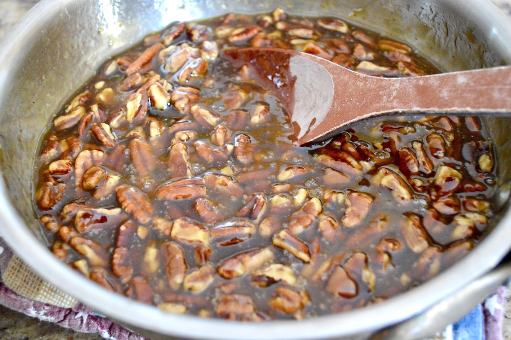 Once the crust for the bourbon bacon pecan went into the oven, I started on the filling. It was such an incredible mixture of pecans, crumbled bacon, corn syrup, maple syrup, bourbon and vanilla. Once it cooled enough, I also stirred in three eggs to make it gorgeously custardy! 