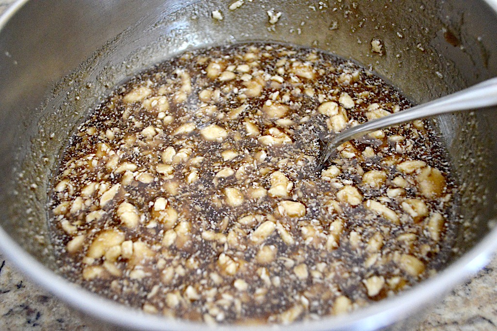 While the dough proofed, I made the amazing glaze for the gingerbread sticky buns. They wouldn't have been very sticky or delicious without it! All I did was stir completely softened butter, maple syrup, sugar and water together. 