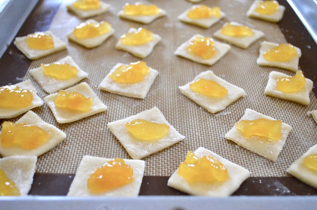 We filled the Polish kiffles with both apricot and cherry pastry filling. The canned stuff was perfect, especially since this recipe was labor intensive enough!