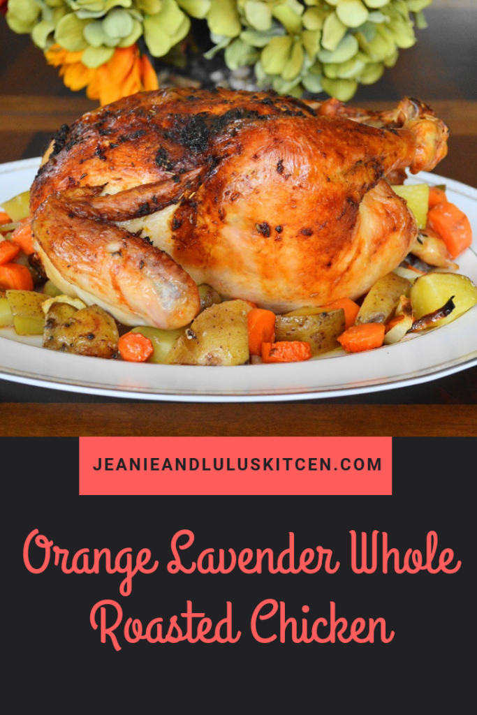 This is such a juicy and wonderful orange lavender whole roasted chicken with veggies that comes together in an easy sheet pan meal! #chicken #dinner #roastedchicken #jeanieandluluskitchen