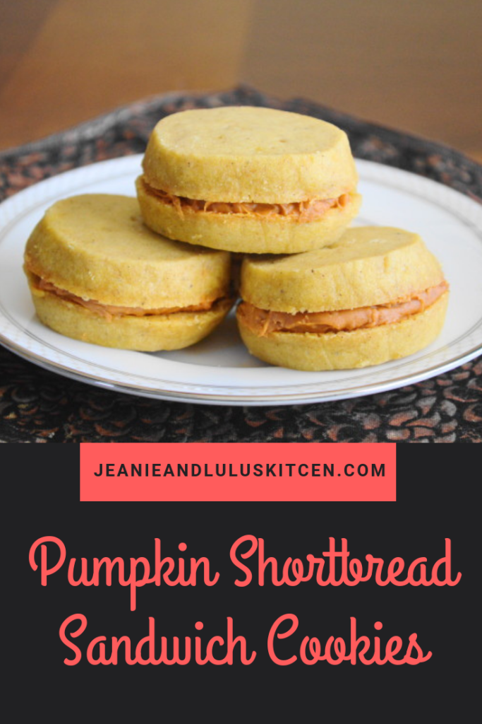 These are such decadent and wonderful pumpkin shortbread sandwich cookies filled with luscious pumpkin flavored cookie butter! #cookies #shortbread #pumpkin #pumpkinshortbreadsandwichcookies #jeanieandluluskitchen