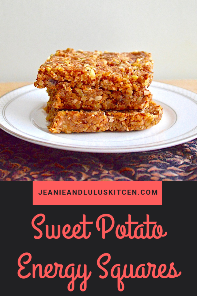 These are such hearty and wonderfully chewy sweet potato energy squares packed with dates, nuts, coconuts, flax and warm spices! #energybars #sweetpotato #vegan #sweetpotatoenergysquares #jeanieandluluskitchen