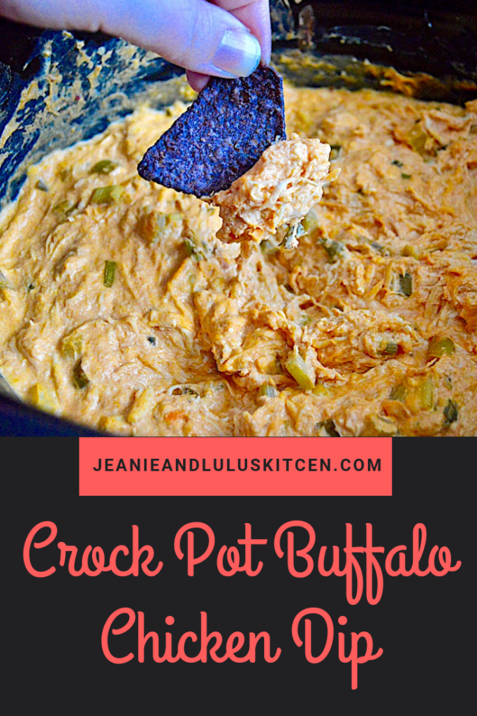 This is such a hearty and simple crock pot buffalo chicken dip to really spice up game day or any party! #dips #snacks #chicken #buffalochicken #crockpotbuffalochickendip #jeanieandluluskitchen