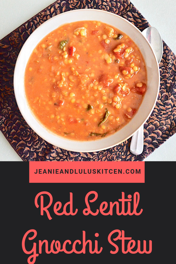 This is such a hearty and warming red lentil gnocchi stew with lots of veggies and fluffy sweet potato gnocchi making it a bowl of pure winter comfort. #stew #lentils #gnocchi #redlentilgnocchistew #jeanieandluluskitchen