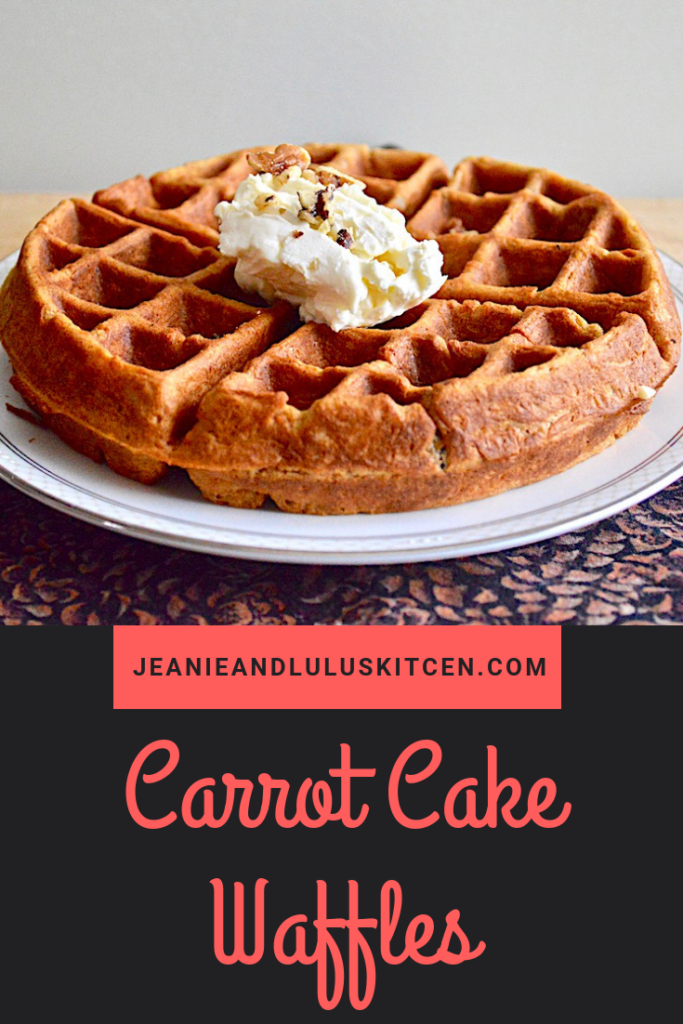 These carrot cake waffles are so fluffy and gorgeously flavored with a luscious cream cheese topping! They are so perfect for Easter brunch. #waffles #breakfast #brunch #easter #carrotcakewaffles #jeanieandluluskitchen