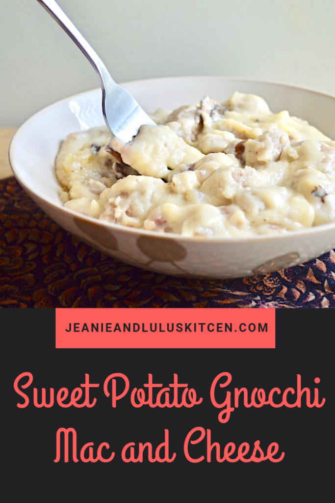 This sweet potato gnocchi mac and cheese is pure, luscious comfort food with lots of mushrooms, prosciutto and three kinds of cheese! #macandcheese #gnocchi #comfortfood #sweetpotatognocchimacandcheese #jeanieandluluskitchen