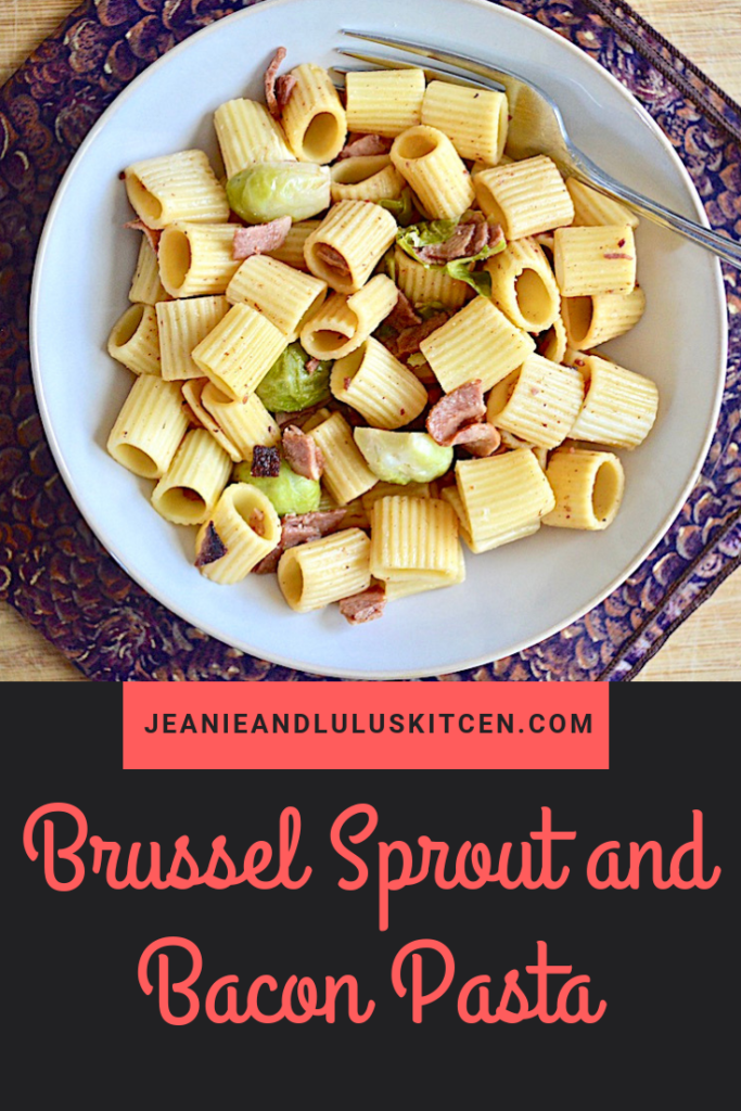 This brussel sprout and bacon pasta is so simple and flavorful! It's my favorite side of brussel sprouts with bacon turned into a complete meal. #pasta #dinner #bacon #brusselsprouts #jeanieandluluskitchen #brusselsproutandbaconpasta