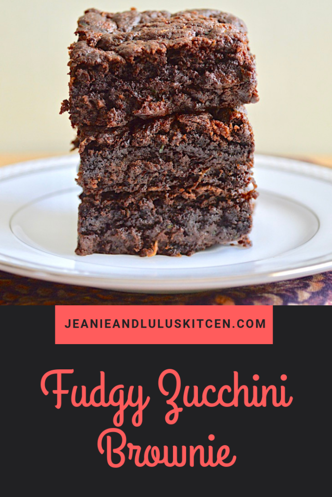 You would never know there is a veggie hidden in these amazing fudgy zucchini brownies! They taste so decadent and are really simple to make. #dessert #brownies #zucchini #fudgyzucchinibrownies #treats #jeanieandluluskitchen