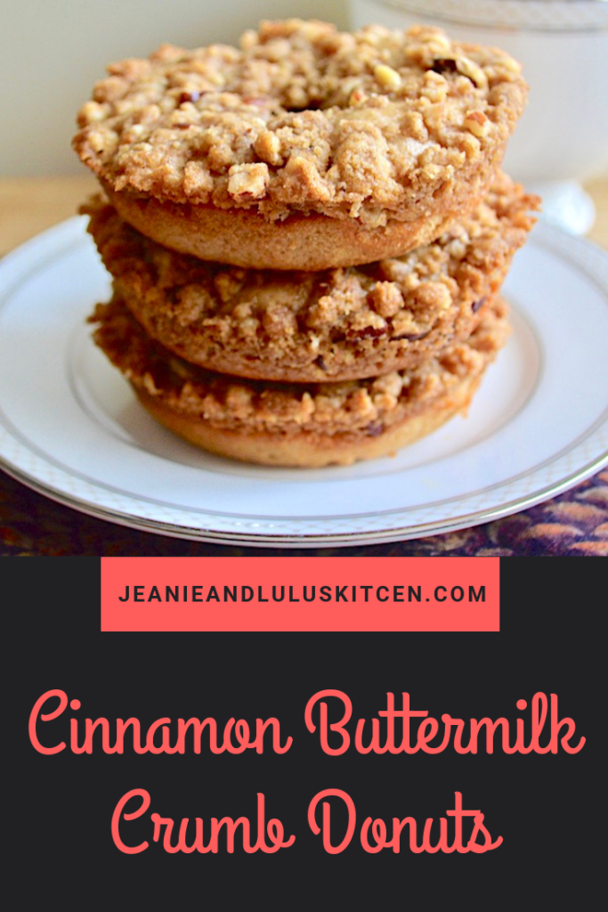 These cinnamon buttermilk crumb donuts are such a fantastic treat with the fluffiest, most warmly spiced donuts and a gorgeous, crunchy pecan crumb topping! #donuts #breakfast #brunch #cinnamonbuttermilkcrumbdonuts #jeanieandluluskitchen